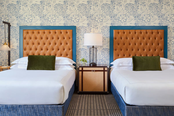 kimpton-denver-colorado-hotel-monaco-guestroom-double-queen-sleeping-room-headboards-beds-8340987c
